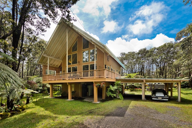 back of house featuring a lawn