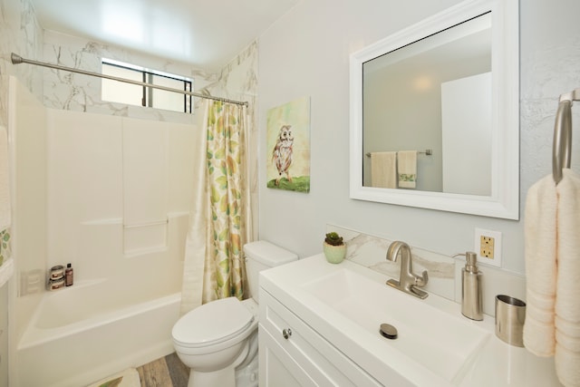 full bathroom featuring hardwood / wood-style floors, shower / bath combination with curtain, vanity, and toilet