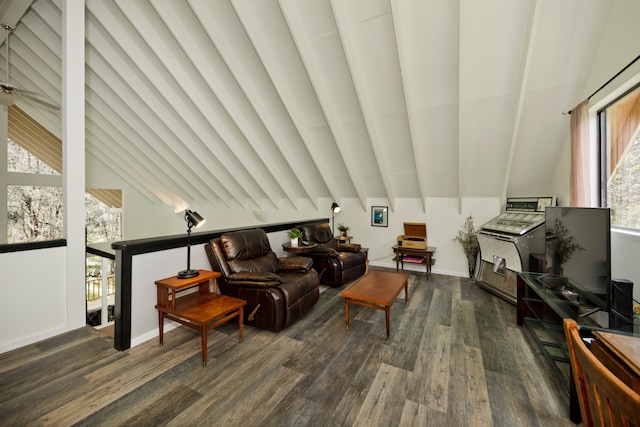 living room featuring a wealth of natural light, dark hardwood / wood-style flooring, and beam ceiling