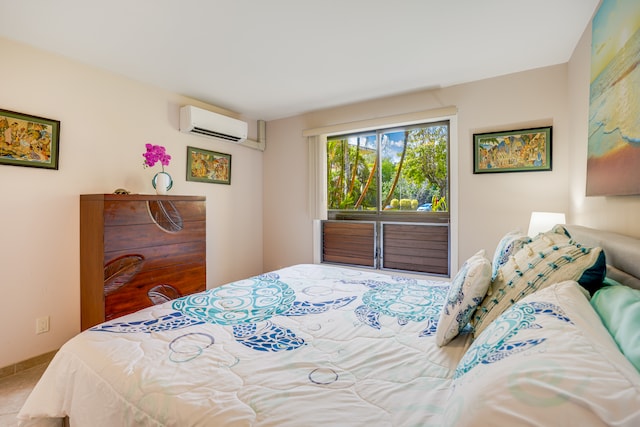 bedroom with an AC wall unit