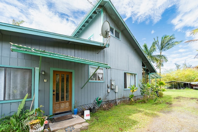 view of home's exterior featuring a lawn