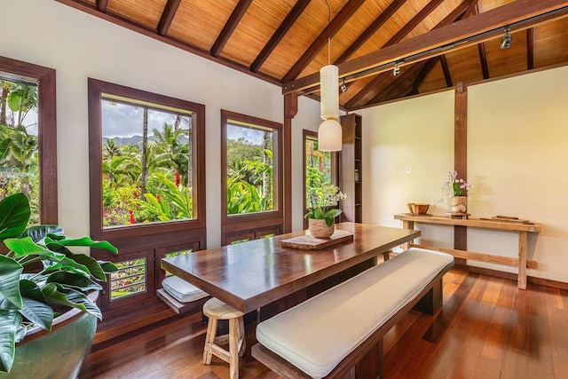 dining room with wooden ceiling, high vaulted ceiling, beamed ceiling, and dark hardwood / wood-style flooring