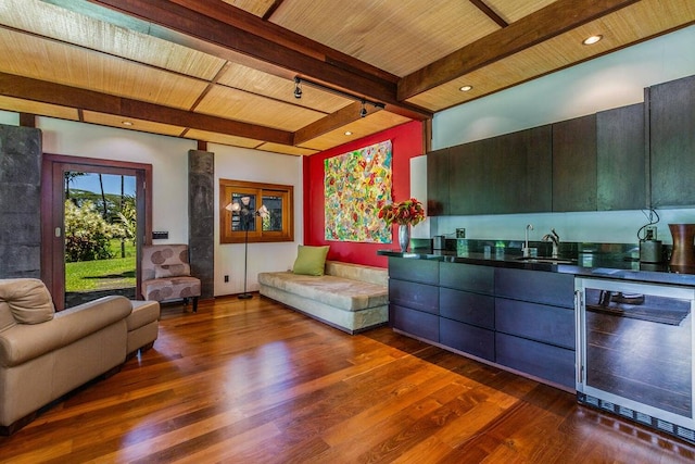 living room with beamed ceiling, wine cooler, sink, wood ceiling, and dark hardwood / wood-style floors