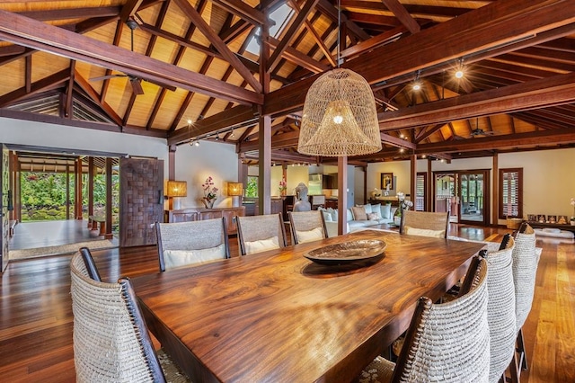 dining area with beamed ceiling and wood ceiling