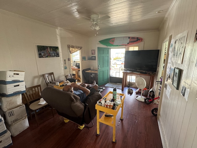 living room featuring ceiling fan, crown molding, and hardwood / wood-style flooring