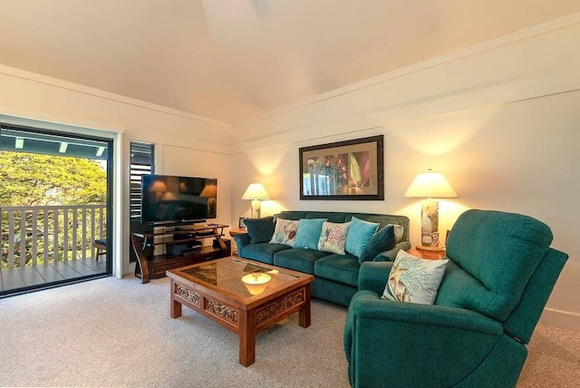 carpeted living room featuring crown molding