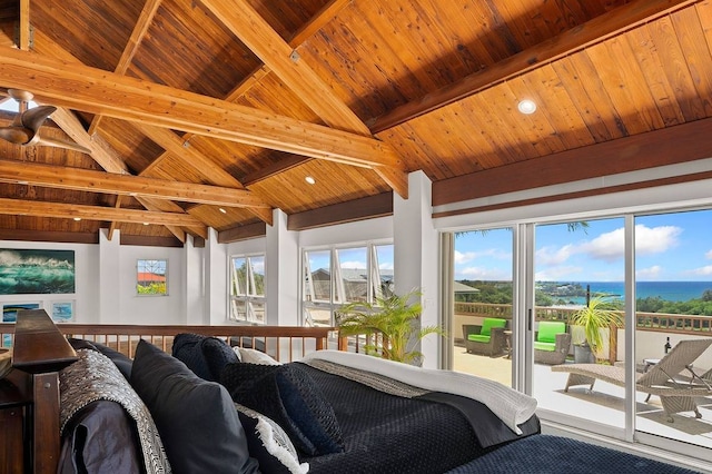 sunroom with wood ceiling, a water view, and vaulted ceiling with beams