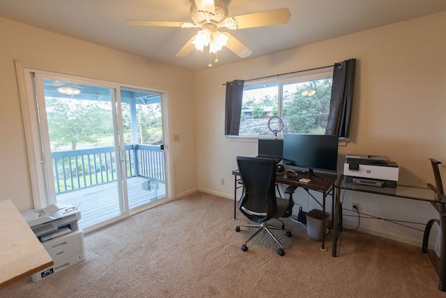 office with ceiling fan, a healthy amount of sunlight, and carpet floors