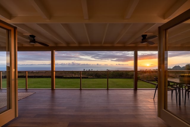 patio terrace at dusk with ceiling fan