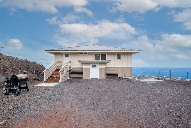 exterior space featuring a water view