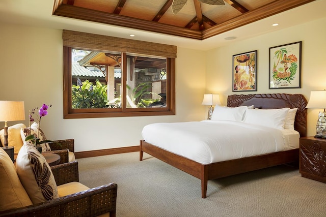 carpeted bedroom featuring beamed ceiling, ceiling fan, and wood ceiling