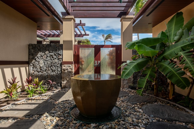 exterior space featuring a pergola