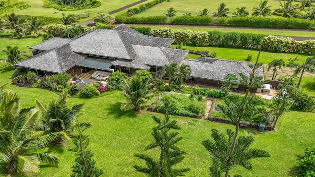 birds eye view of property with a rural view