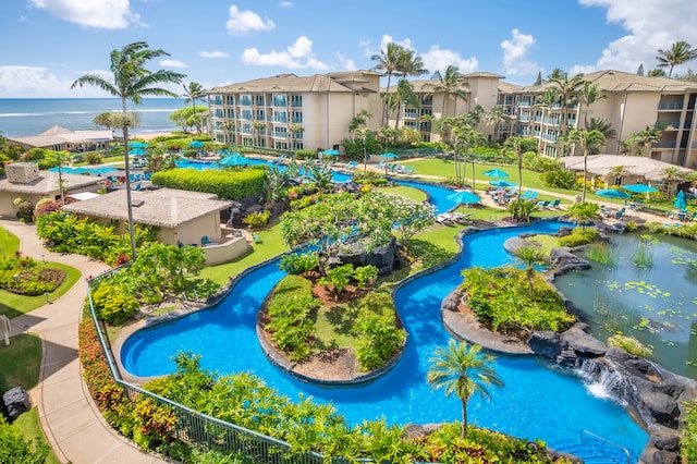 surrounding community featuring a water view