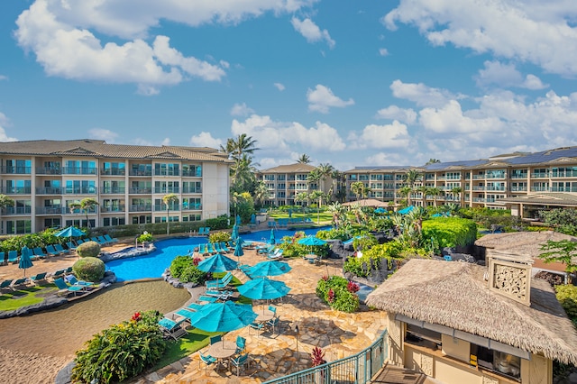 view of home's community featuring a pool