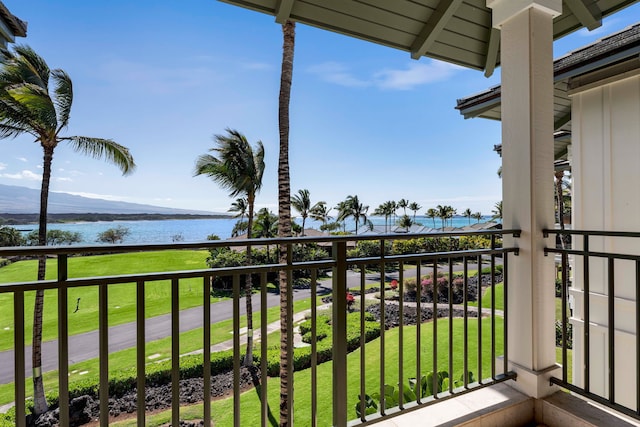 balcony featuring a water view