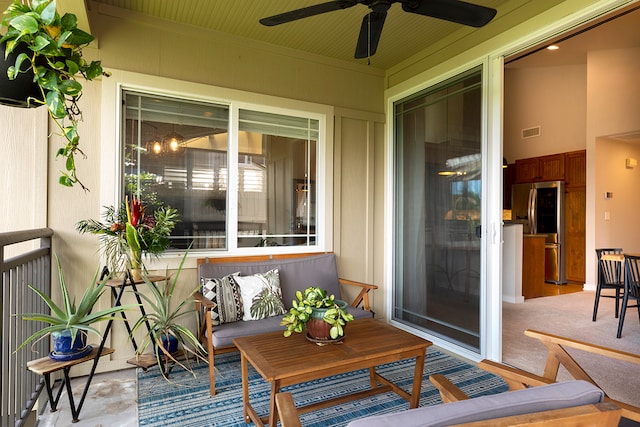 exterior space featuring ceiling fan