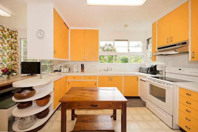 kitchen featuring white electric stove and light tile floors