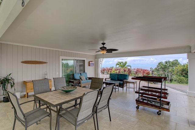 view of patio / terrace with an outdoor living space and ceiling fan