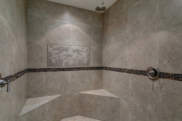 bathroom featuring a tile shower