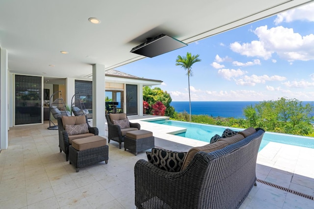 view of terrace with outdoor lounge area and a water view