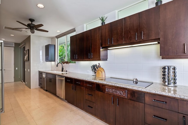 kitchen featuring black electric stovetop, light stone countertops, backsplash, stainless steel dishwasher, and ceiling fan