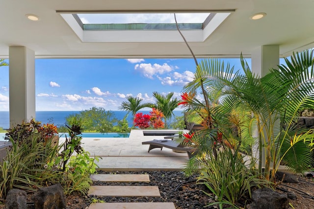 view of terrace featuring a water view