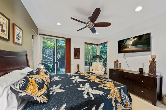 tiled bedroom featuring ceiling fan and access to outside