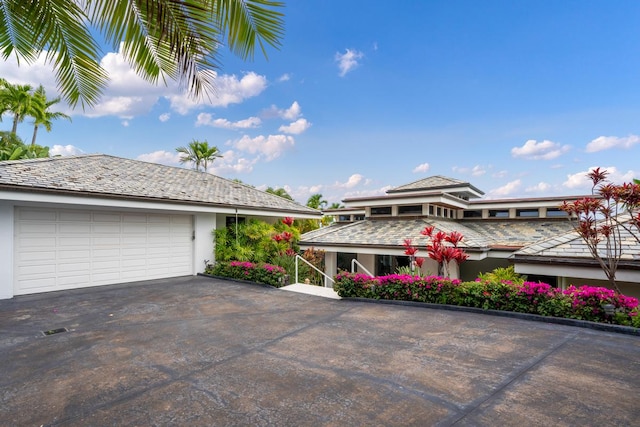 view of property exterior featuring a garage