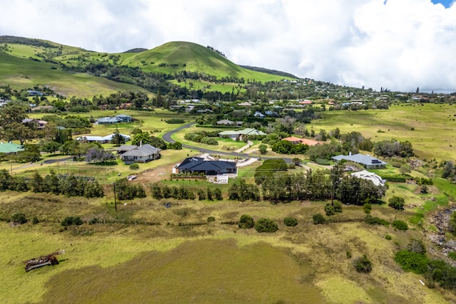 drone / aerial view featuring a mountain view