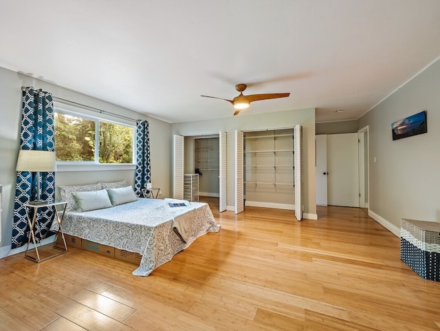 bedroom featuring light wood-type flooring and ceiling fan