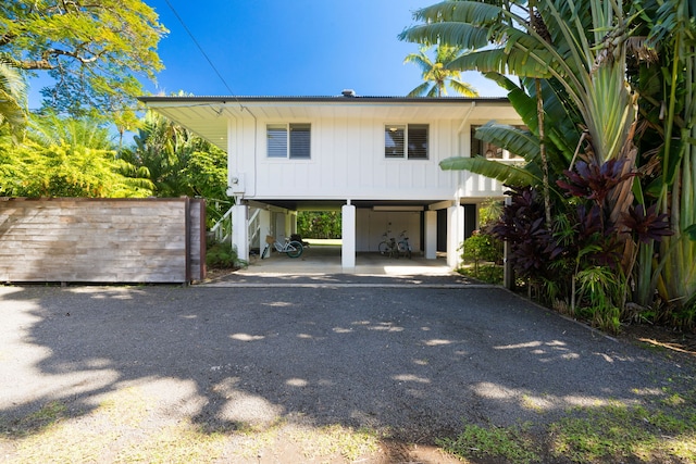 view of front of home with a carport