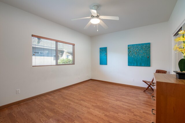 interior space featuring ceiling fan and hardwood / wood-style floors