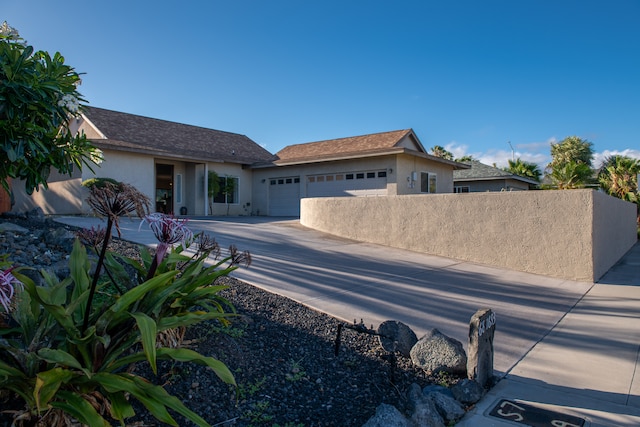 view of front of home with a garage