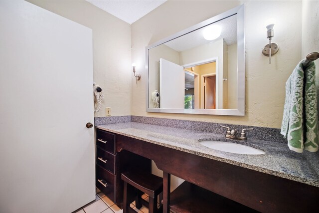 bathroom featuring vanity and tile patterned floors