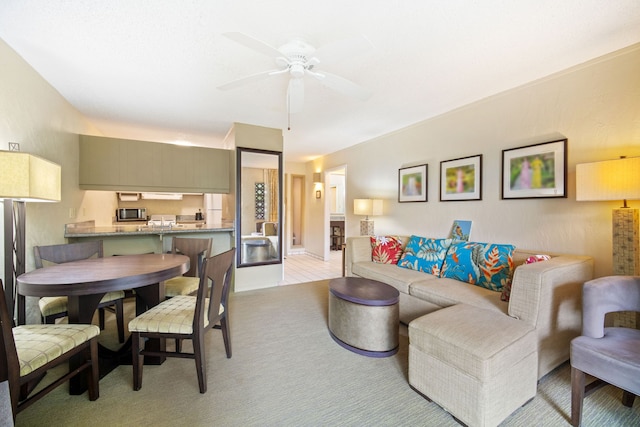 living room featuring ceiling fan