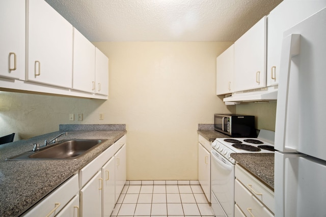 kitchen with sink, white cabinetry, light tile patterned floors, and white appliances