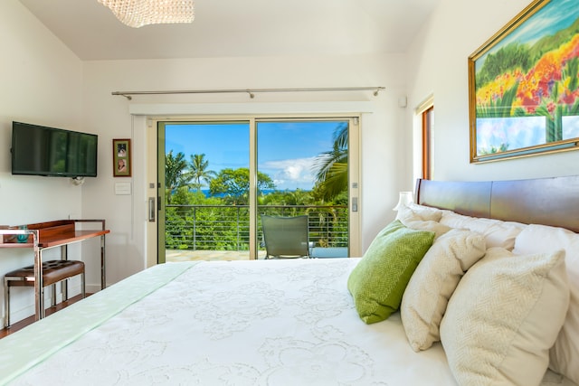 bedroom featuring access to outside and multiple windows