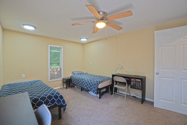 bedroom featuring carpet and ceiling fan