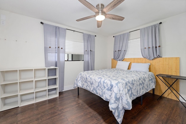 bedroom with ceiling fan and wood finished floors