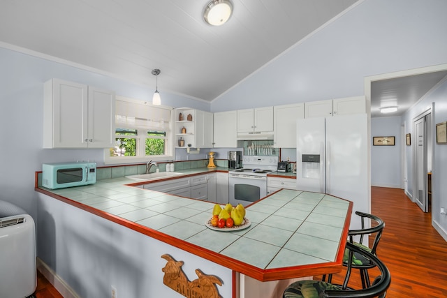 kitchen featuring decorative light fixtures, white appliances, sink, dark hardwood / wood-style flooring, and ornamental molding