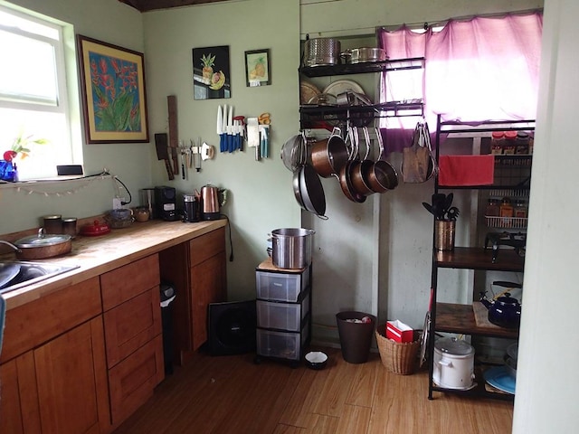 office space with sink and hardwood / wood-style floors