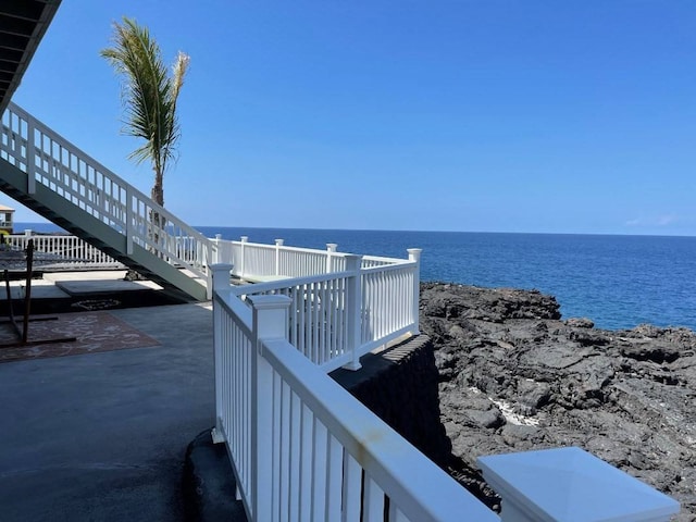 view of home's community featuring a water view