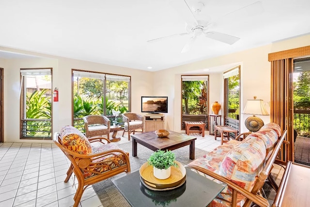 living room featuring ceiling fan and light tile flooring