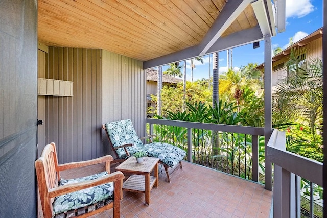 sunroom with wood ceiling