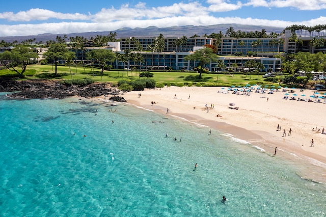 bird's eye view featuring a beach view and a water and mountain view