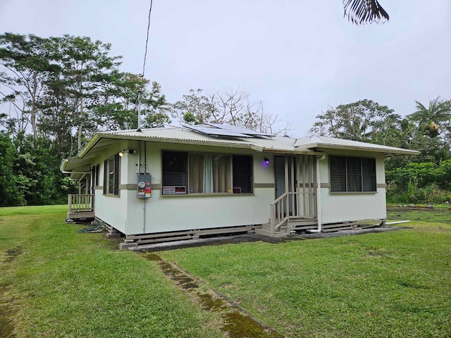 view of front facade with a front lawn