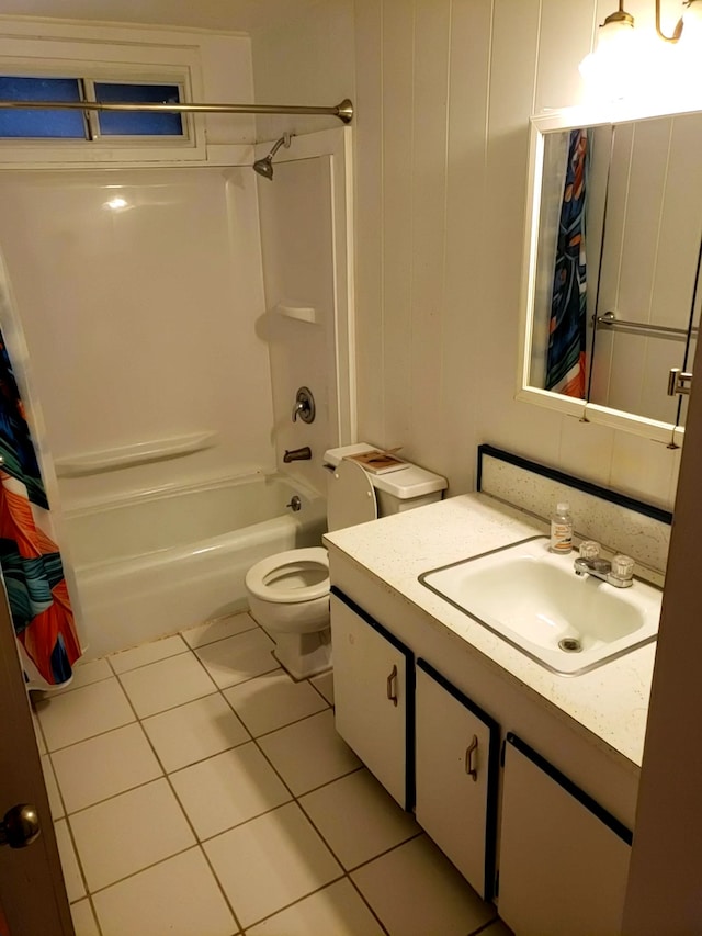 full bathroom featuring tile flooring, shower / bath combination with curtain, vanity, and toilet