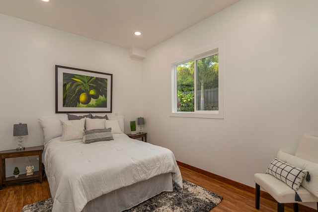 bedroom featuring dark wood-type flooring