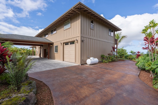 view of property exterior with a garage